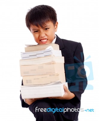 Boy With Lots Of  Books Stock Photo
