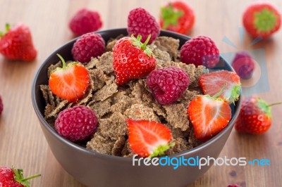 Bran Flakes With Fresh Raspberries And Strawberries Stock Photo