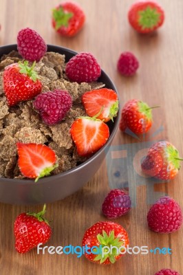 Bran Flakes With Fresh Raspberries And Strawberries Stock Photo