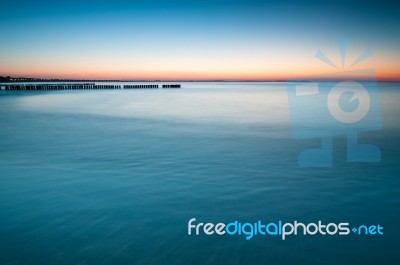 Breakwater Sunset Stock Photo