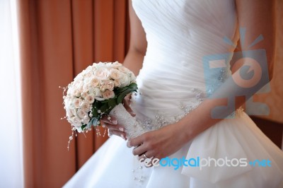 Bride Holding Wedding Rose Bouquet Stock Photo