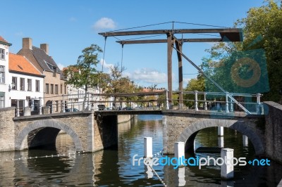 Bridge Over A Canal In Bruges West Flanders In Belgium Stock Photo