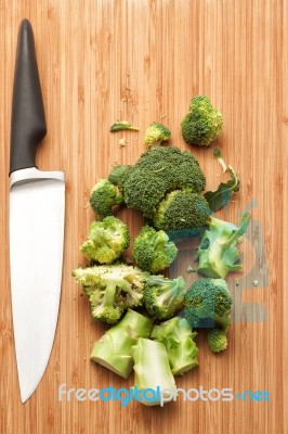 Broccoli With Knife Stock Photo
