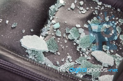 Broken Glass On Car Seat Stock Photo