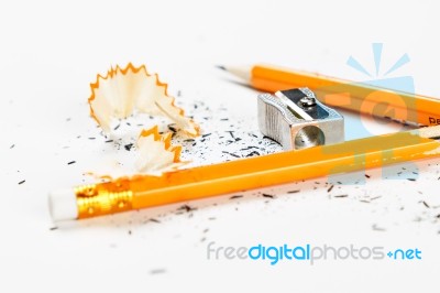 Broken Pencil With Metal Sharpener And Shavings Stock Photo