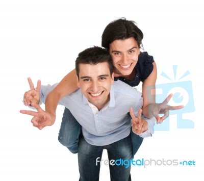 Brother And Sister Showing Victory Sign Stock Photo