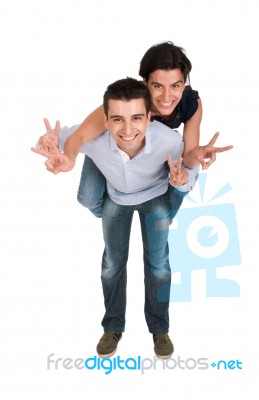 Brother And Sister Showing Victory Sign Stock Photo