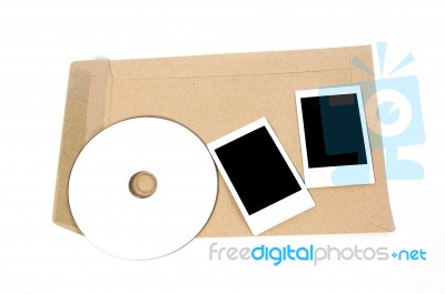 Brown Envelope Document With Cd-rom And Frame Stock Photo