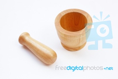 Brown Wooden Mortar On White Stock Photo