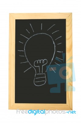 Bulb On Blackboard Stock Image