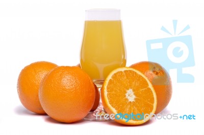 Bunch Of Oranges With Juice Stock Photo