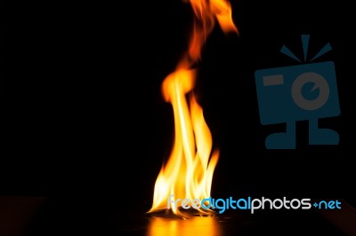 Burning Fire Flame On Black Background Stock Photo