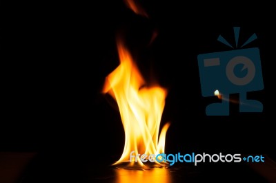 Burning Fire Flame On Black Background Stock Photo