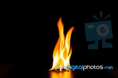 Burning Fire Flame On Black Background Stock Photo
