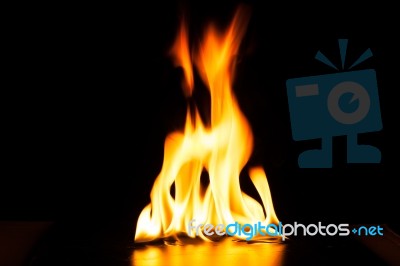 Burning Fire Flame On Black Background Stock Photo
