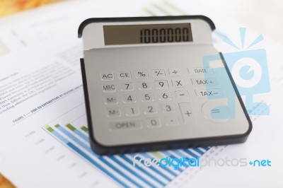 Business Analysis - Accounting Report With Calculator Stock Photo