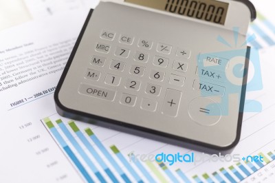 Business Analysis - Accounting Report With Calculator Stock Photo