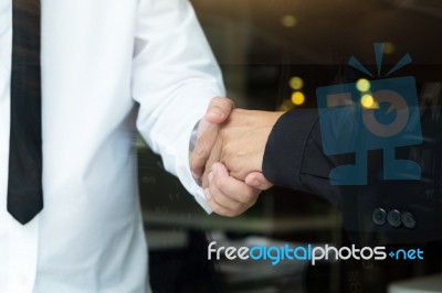 Business And Office Concept - Businessman Shaking Hands Stock Photo