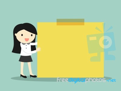 Business Concept, Business Woman Holding Yellow Sticky Note With Green Background Stock Image