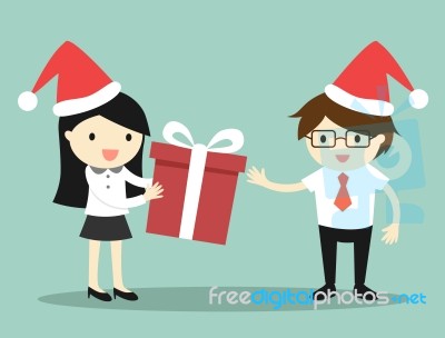 Business Concept, Business Woman Is Giving Red Gift Box To Businessman For Christmas Festival Stock Image