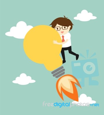 Business Concept, Businessman Holding Big Bulb Light With Start Up Concept Stock Image