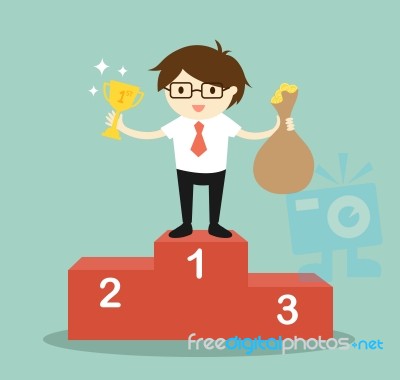 Business Concept, Businessman Standing On The Winning Podium, He Holding Trophy And A Bag Of Money Stock Image
