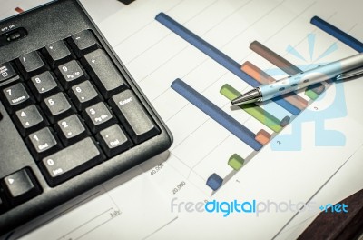 Business Documents And Keyboards Stock Photo
