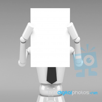 Business Doll Showing A Blank Paper In Front Of Face Stock Image