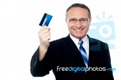 Business Executive Holding Credit Card Stock Photo