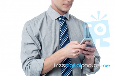 Business Executive Using Cell Phone Stock Photo