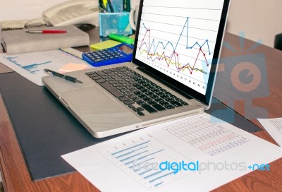 Business Finance Paper Chart On Desk Stock Photo