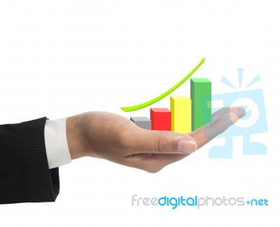 Business Hand Holding Growing Graph Stock Photo