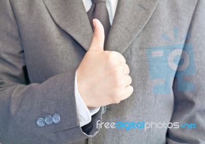 Business Hand Shows Thumb Up Stock Photo