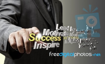 Business hand touching success word Stock Photo