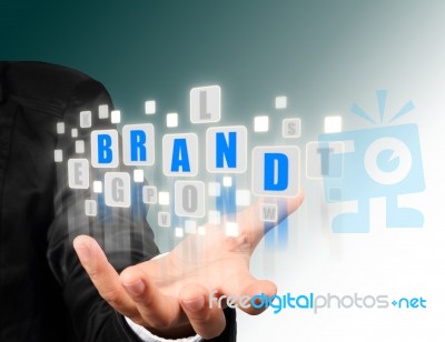 Business Hand With Brand Text Stock Photo