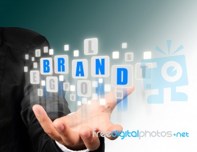Business Hand With Brand Text Stock Photo