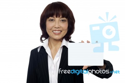 Business Lady Showing Blank Card Stock Photo
