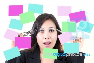 Business Lady Thinking With Note Stock Photo