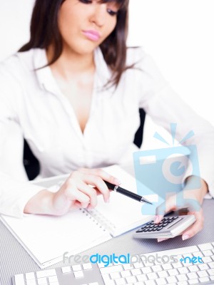 Business Lady Using Calculator Stock Photo