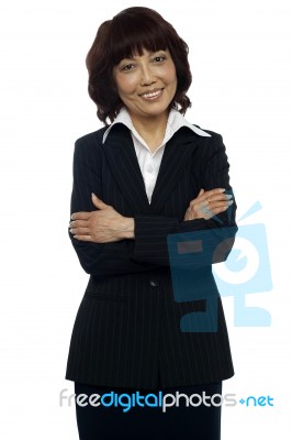 Business Lady With Arms Crossed Stock Photo