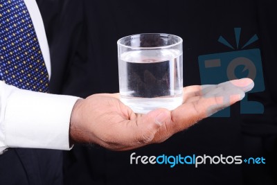 Business Man Holding A Glass Of Water Stock Photo Business Man Holding A Glass Of Water Stock Photo
