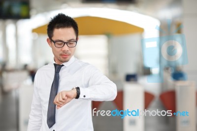 Business Man Looking At Watch At Business Center Stock Photo