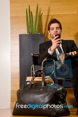 Business Man Reading Sms Stock Photo
