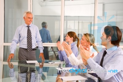 Business Man Receiving Applause Stock Photo