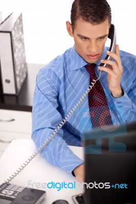 Business Man Talking Over Phone Stock Photo
