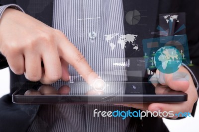 Business Man Using A Touch Screen Device Stock Photo