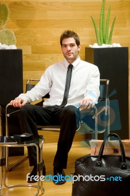 Business Man Waiting In Lobby Stock Photo