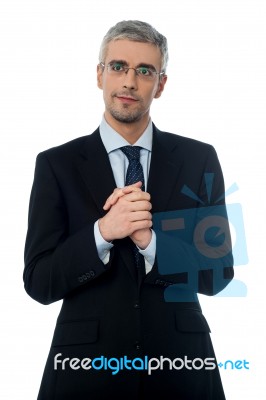 Business Man With Clasped Hands Stock Photo
