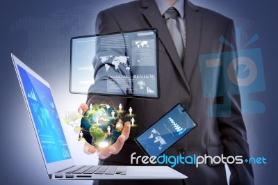 Business Man With Laptop,mobile Phone,touch Screen Device Stock Photo