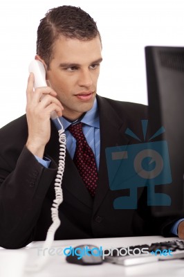Business Men Talking Over Phone Stock Photo